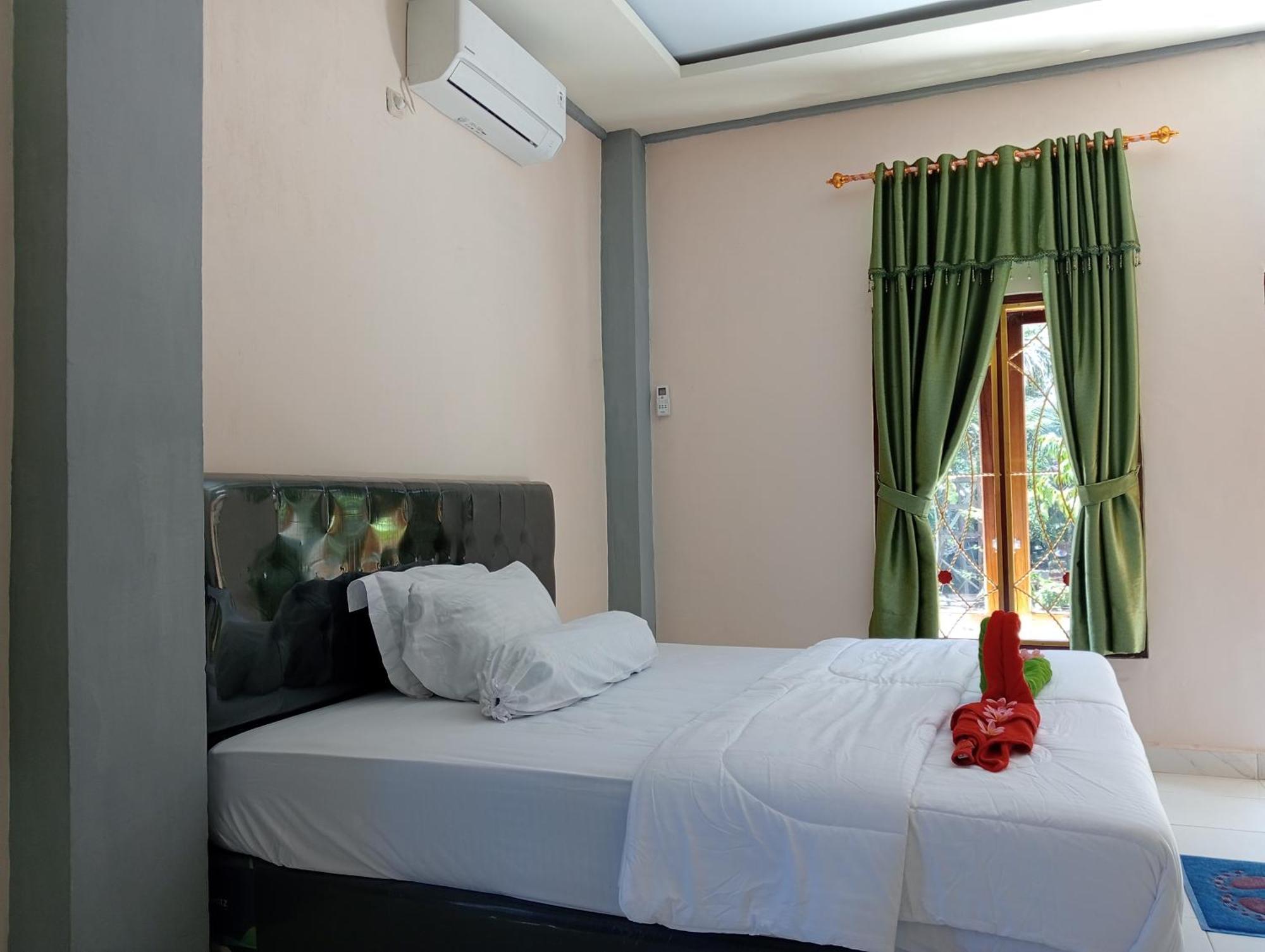 Yusilver Guest House 라부안 바조 객실 사진